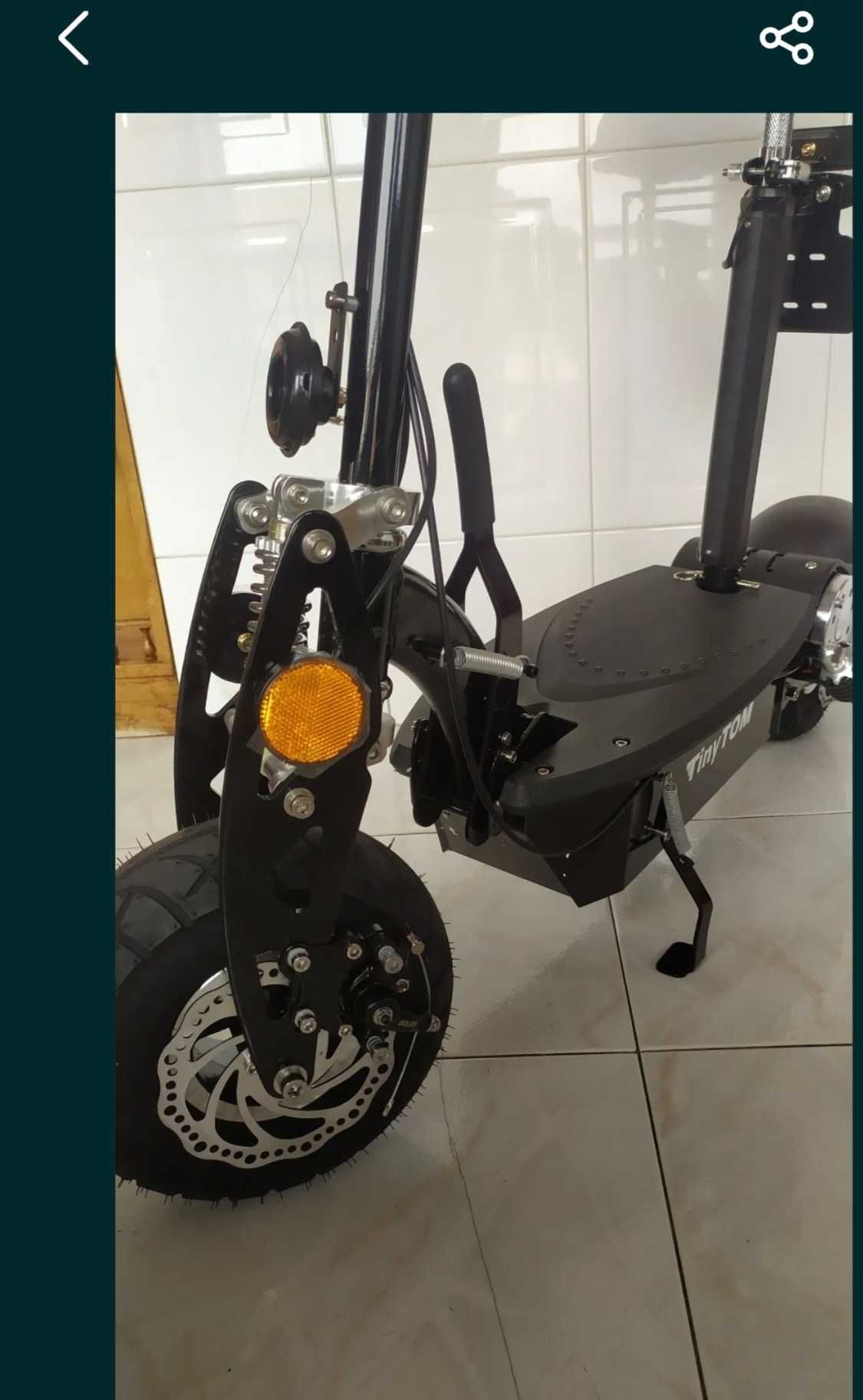 Trotinete tinitom com banco como nova