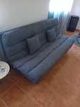 Vendo sofá cama cinza como novo