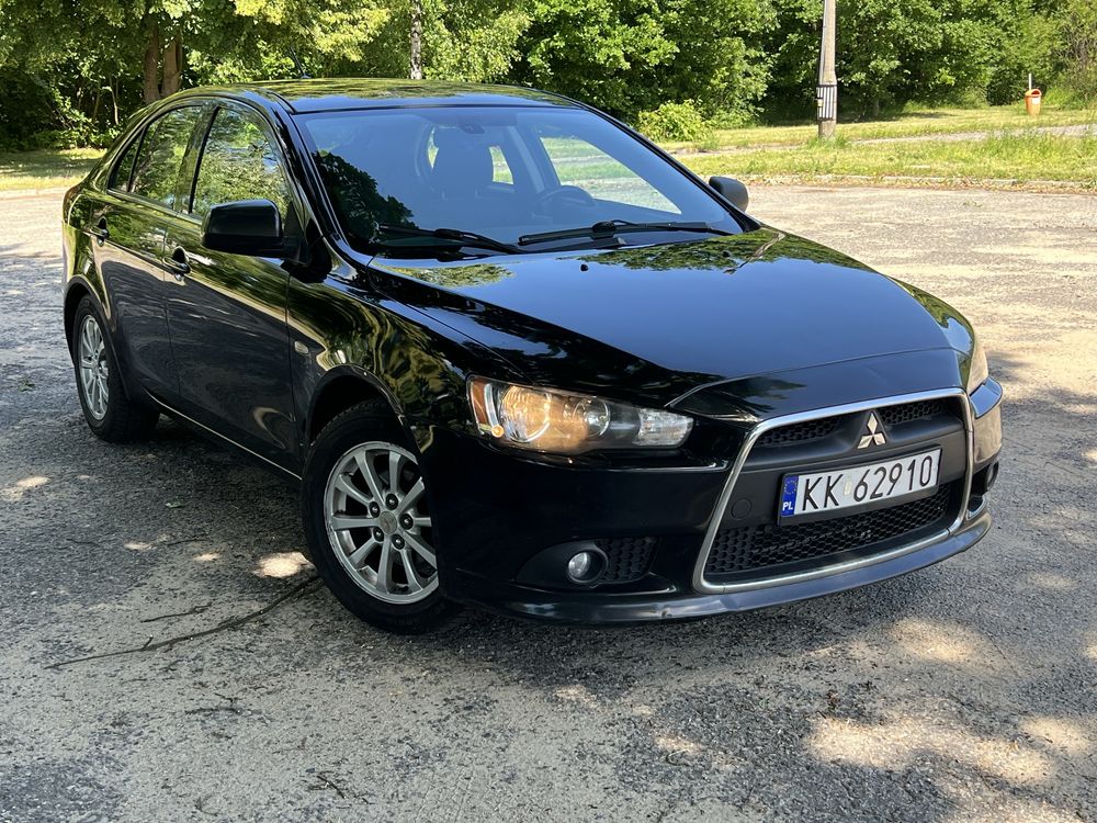Mitsubishi Lancer_1.6 benzyna_Klima_Bez rdzy_2xkomplety kół