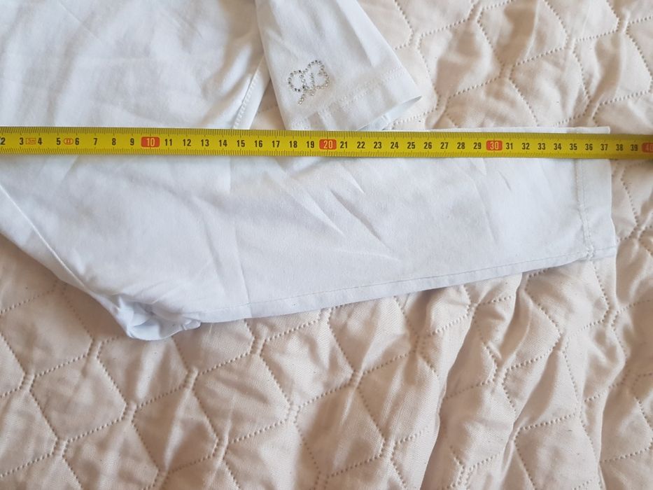 Dzieninowe, białe bolerko dziewczęce z aplikacją