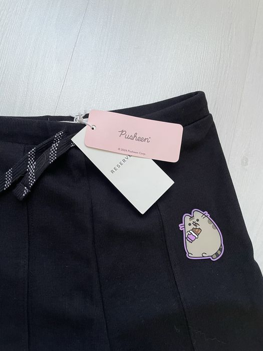 Штани клеш в рубчик