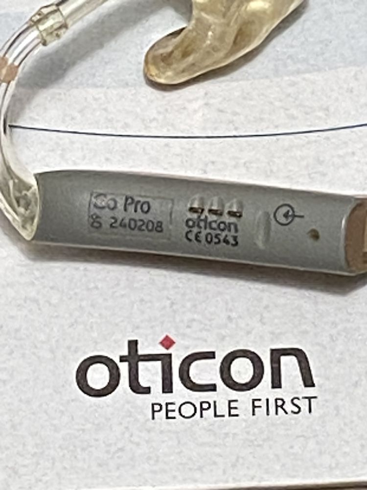 Слуховые аппараты  Oticon