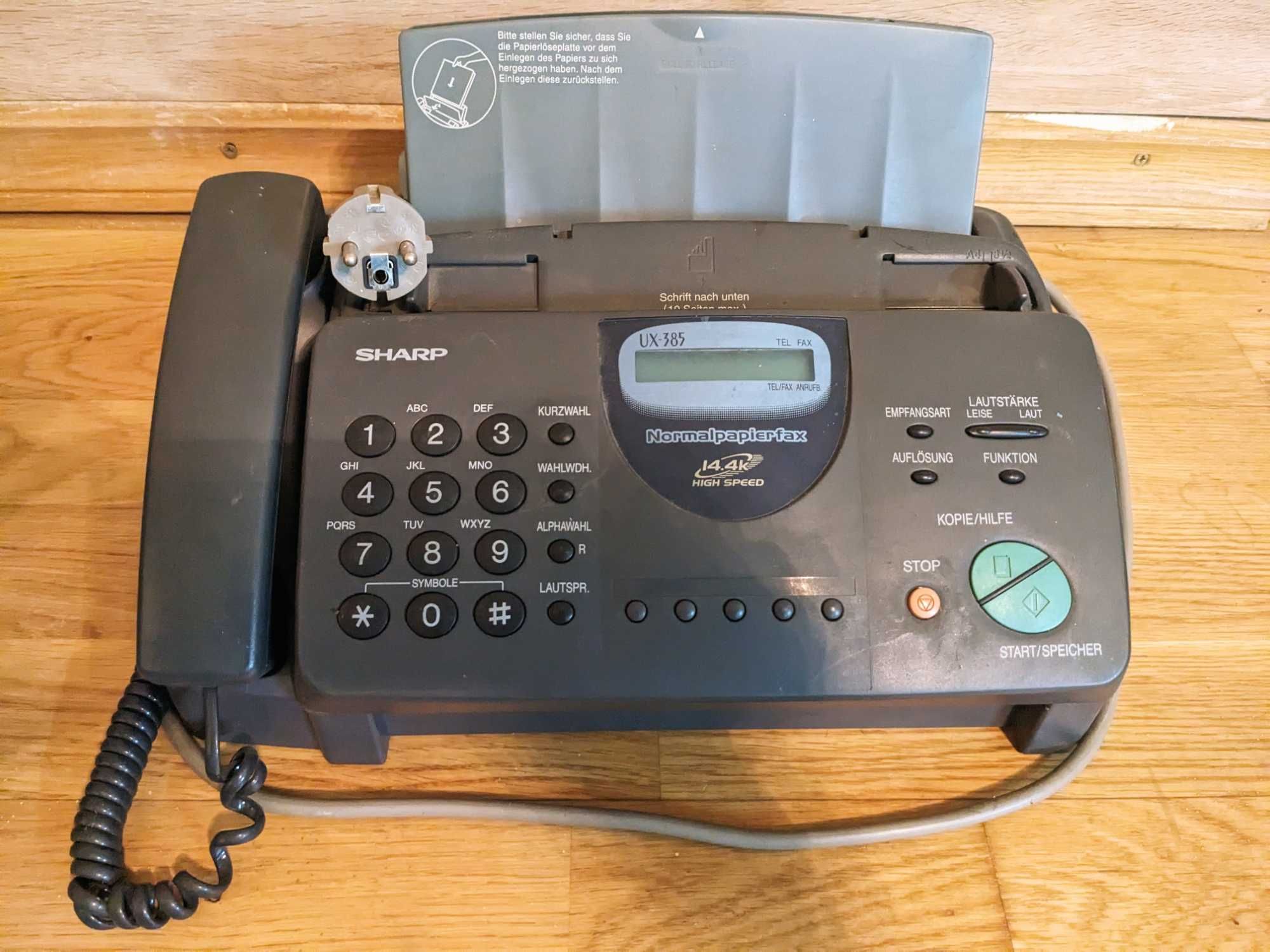 Телефон-факс-ксерокс.  SHARP UX 385, Диван.