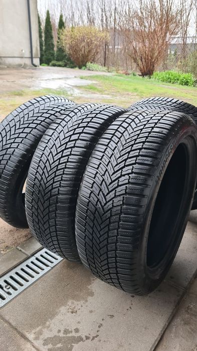 BRIDGESTONE wielosezonowe 215x50x18 2023r na gwarancji