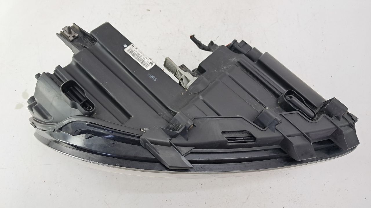 Фара левая Volkswagen Touran 2011-2015 гг 1T1941005G