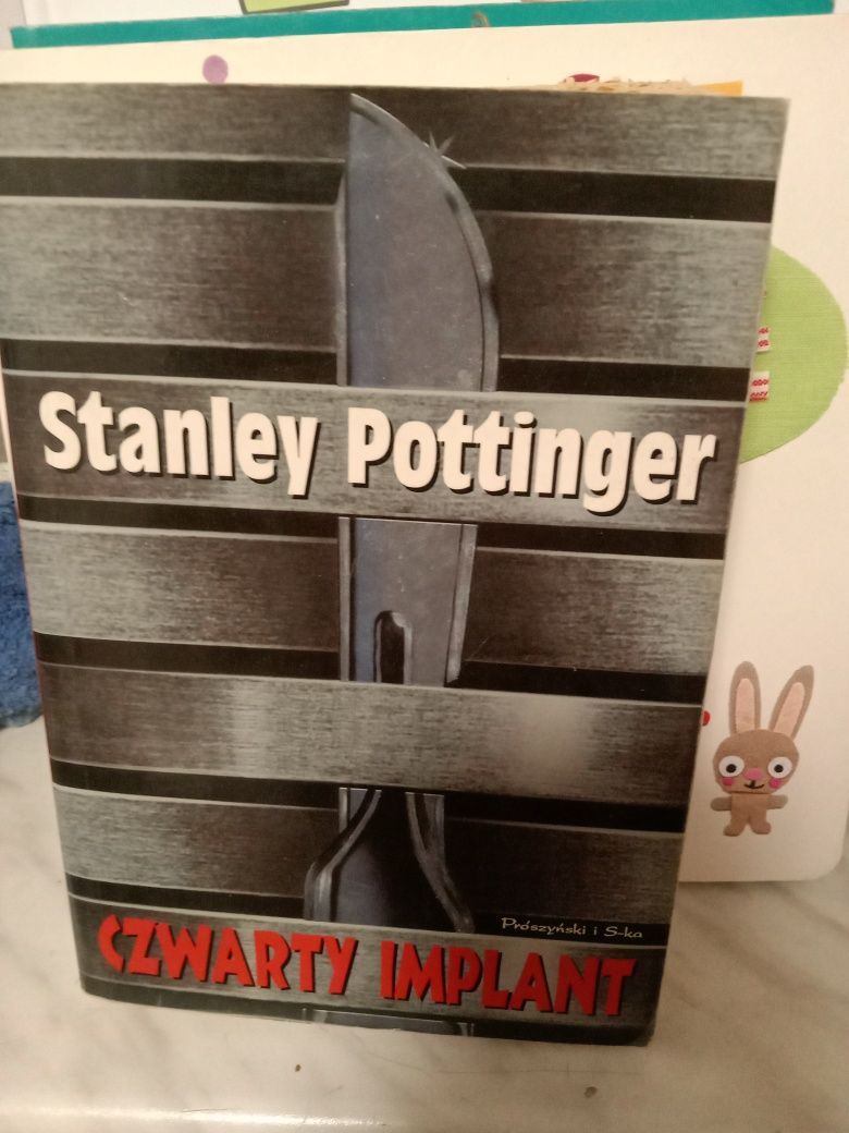 Czwarty implant , Stanley Pottinger.