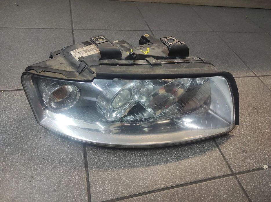 LAMPA PRAWA PRZEDNIA AUDI A4 B6 XENON ..K.W&#039;&#039; USZKODZONA WYSYŁKA !!!