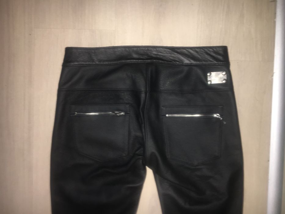 299/ Seksowne czarne spodnie skórzane rurki z zamkami rozmiar S