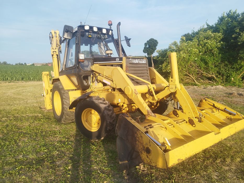 Koparko ładowarka cat 428 JCB cx case 580