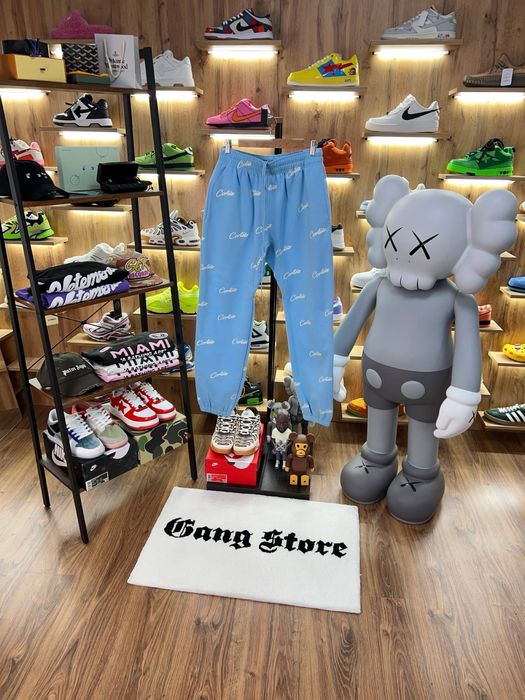 Штани Corteiz All Over Print Joggers Baby Blue
