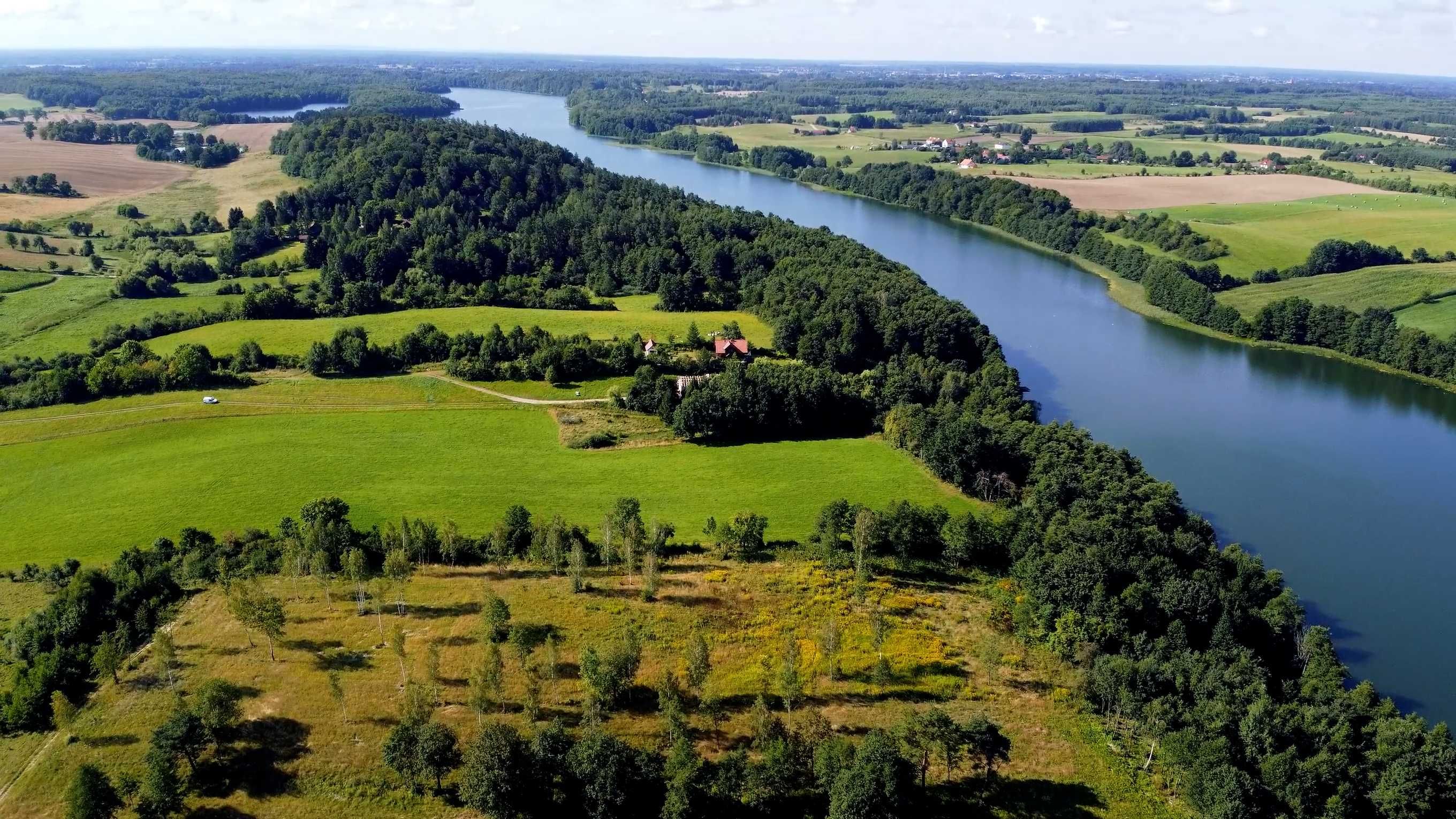 Działka rolna z linią brzegową (10 050 m2)