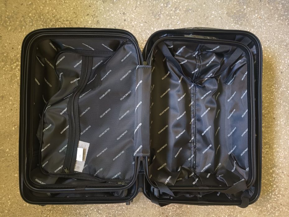 Walizka firmy UNLIMITED (Wings) ABS KANSAS średnia M 24" k szampański