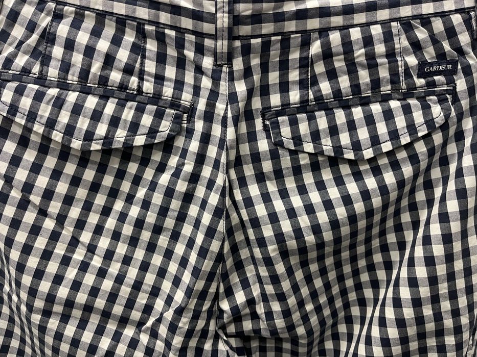 Чоловічі штани в клітинку