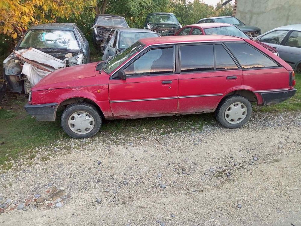 Кузов  запчастини NISSAN sunny B11 по кусочкам