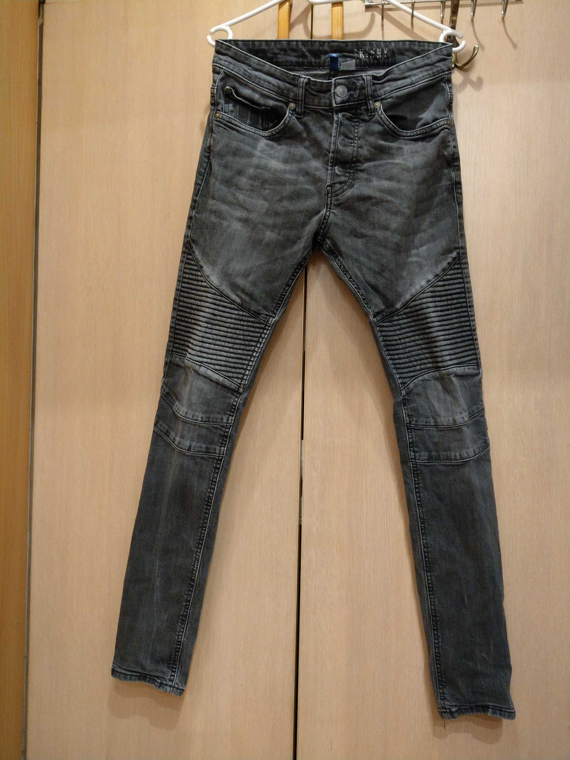 spodnie jeansowe z przetarciami i przeszyciami Divided H&M skinny fit