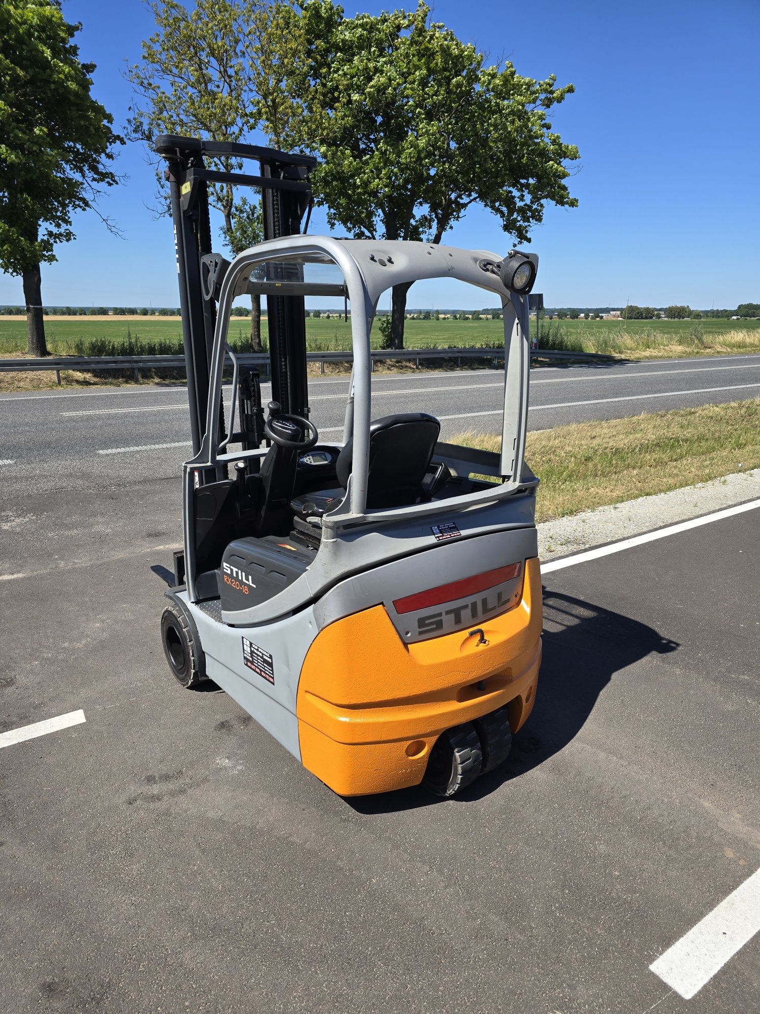 Wózek widłowy elektryczny triplex Still RX20-18 1.8t 6m 2012r widlak