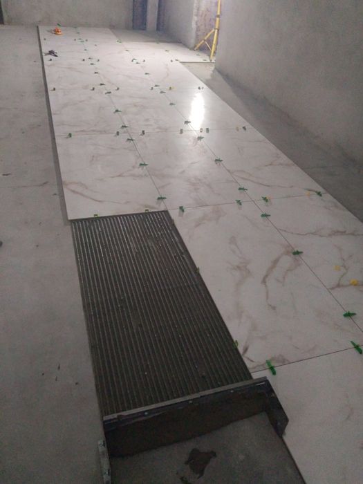 Плиточник,укладання плитки