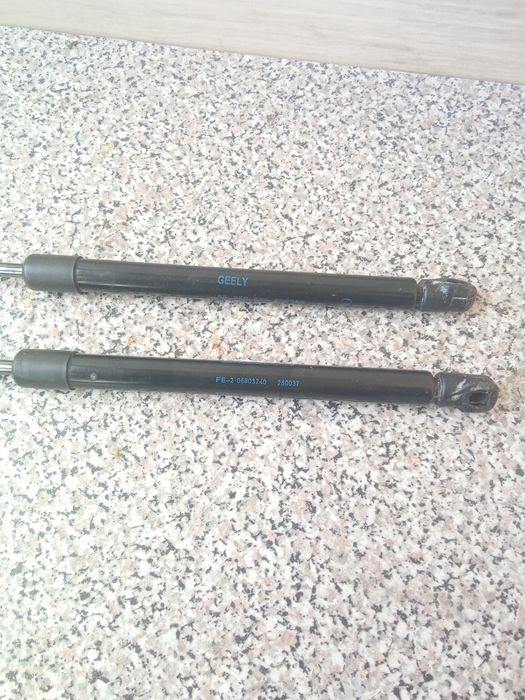 Амортизатори багажника джили емгранд ЕС7-RV