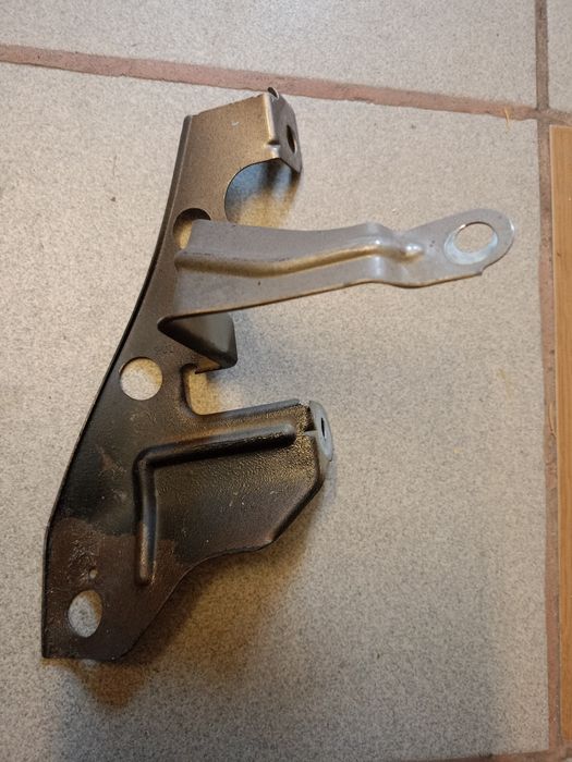 Wspornik lewego błotnika Nissan note e11