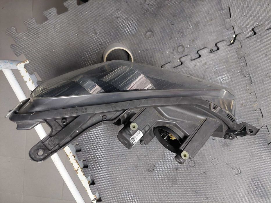 farol esq Opel Astra h