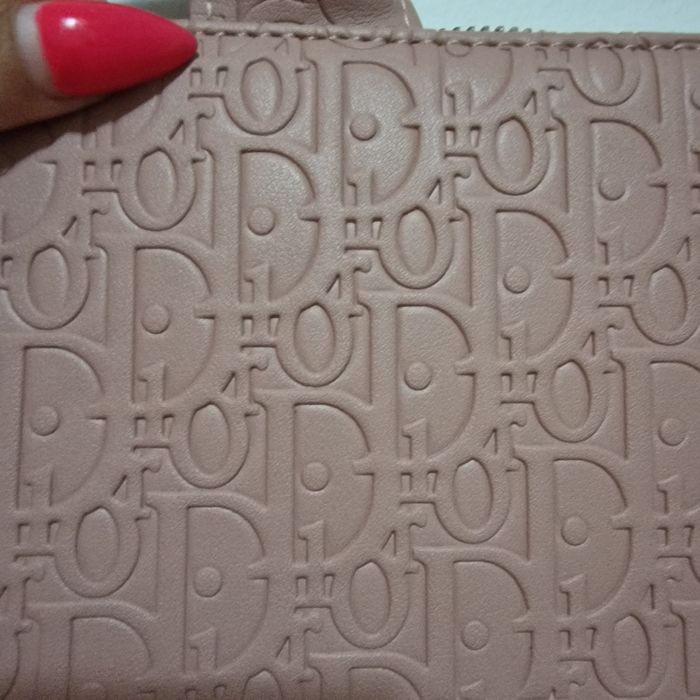 Mala C D rosa velho em pele