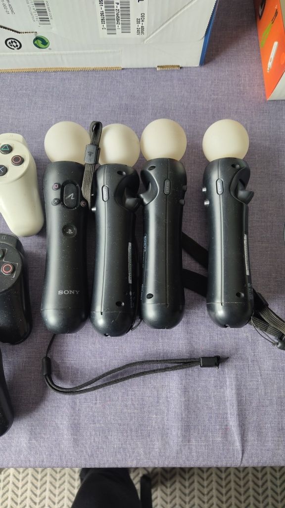 PS3 Super Slim desbloqueada, move, microfones e muitos extras
