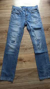 Spodnie jeansowe z dziurami proste