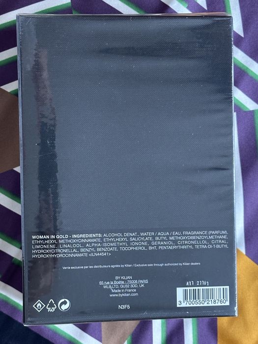 Kilian woman in gold