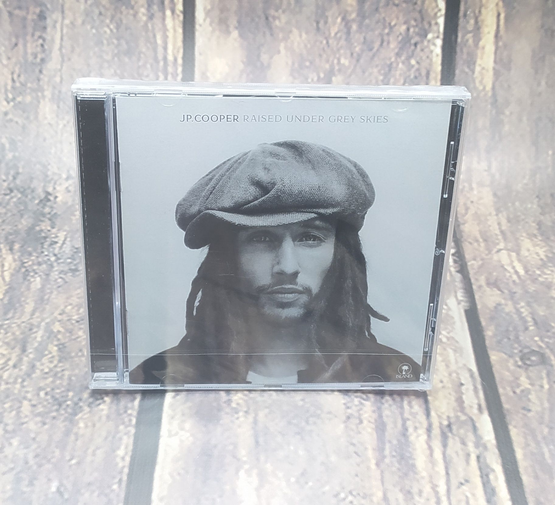 JP. Cooper - Raised Under Grey Skies - cd