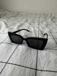 Oculos de sol pretos