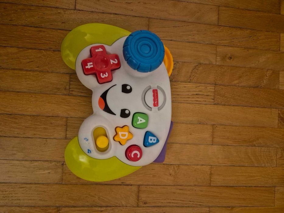 Fisher-Price, Wesoły Padzik Malucha, interaktywna zabawka edukacyjna