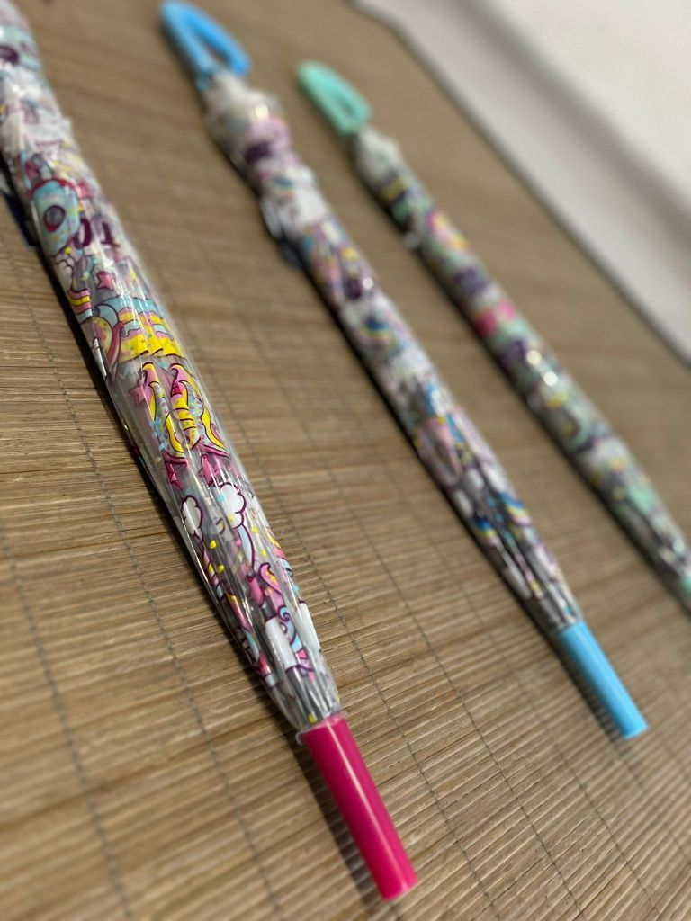 Chapéus de chuva novos e embalados