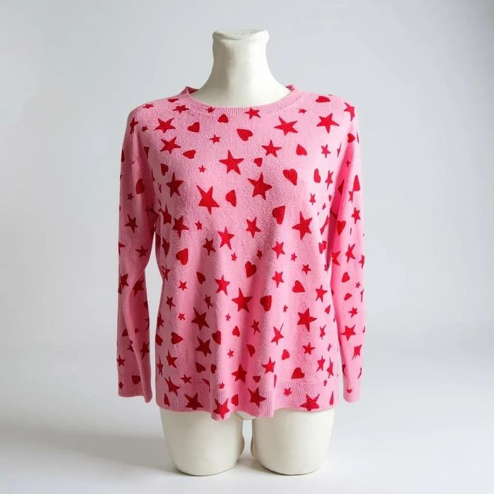 Dziewczęcy różowy sweter w gwiazdki m