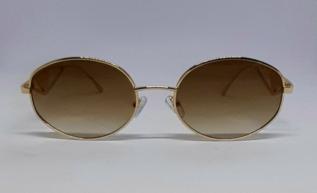 Женские брендовые солнцезащ очки овальные коричневые в золотом металле