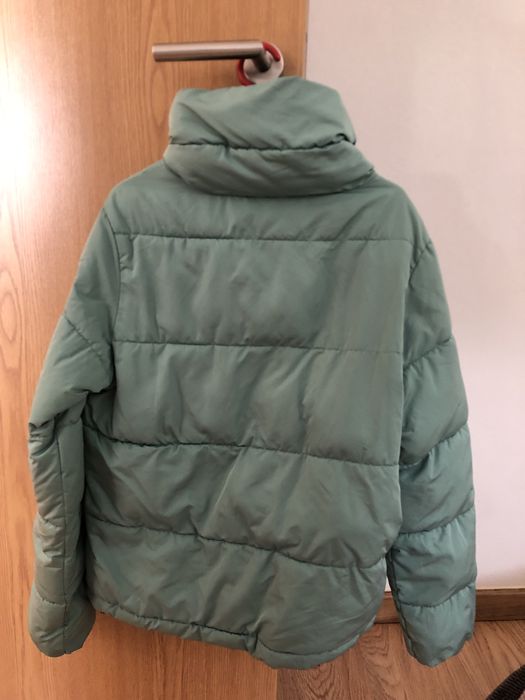 Casaco impermeável azul menta