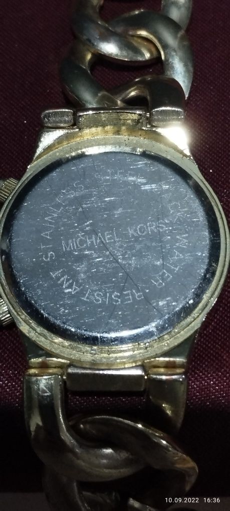 Годинник жіночих Michael Kors плетений браслет в золотистому кольорі
