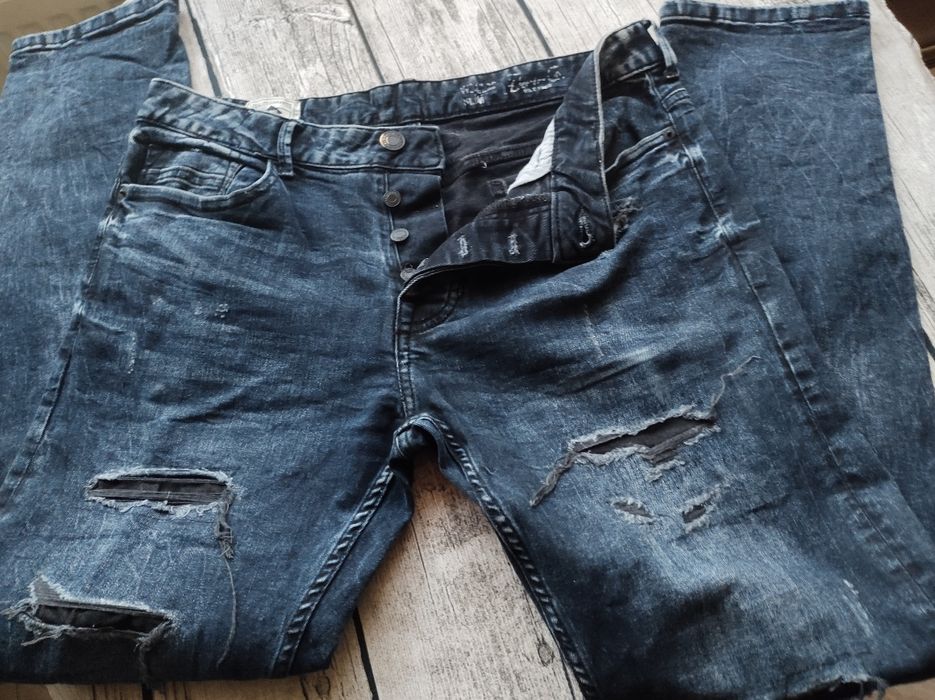 Authentic supply jeansy męskie z dziurami
