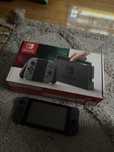 Nintendo Switch v1 + oryginalny pad nintendo + 2 gry