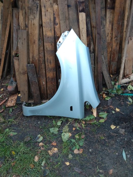 Błotnik przedni lewy Corsa D