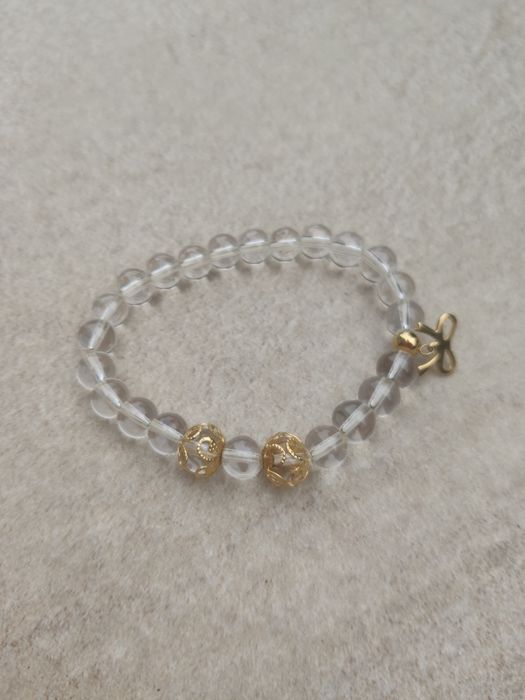 Bransoletka przezroczysta ze złotymi detalami