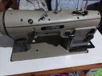 Máquina industrial de costura