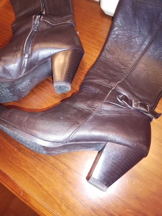 Botas cano alto pele