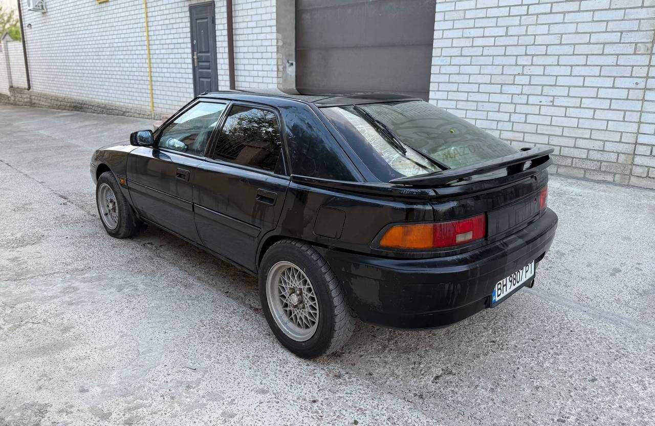 Mazda 323f слепая