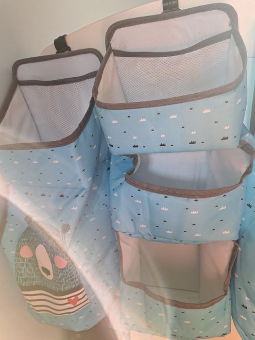 Organizery na łóżeczko