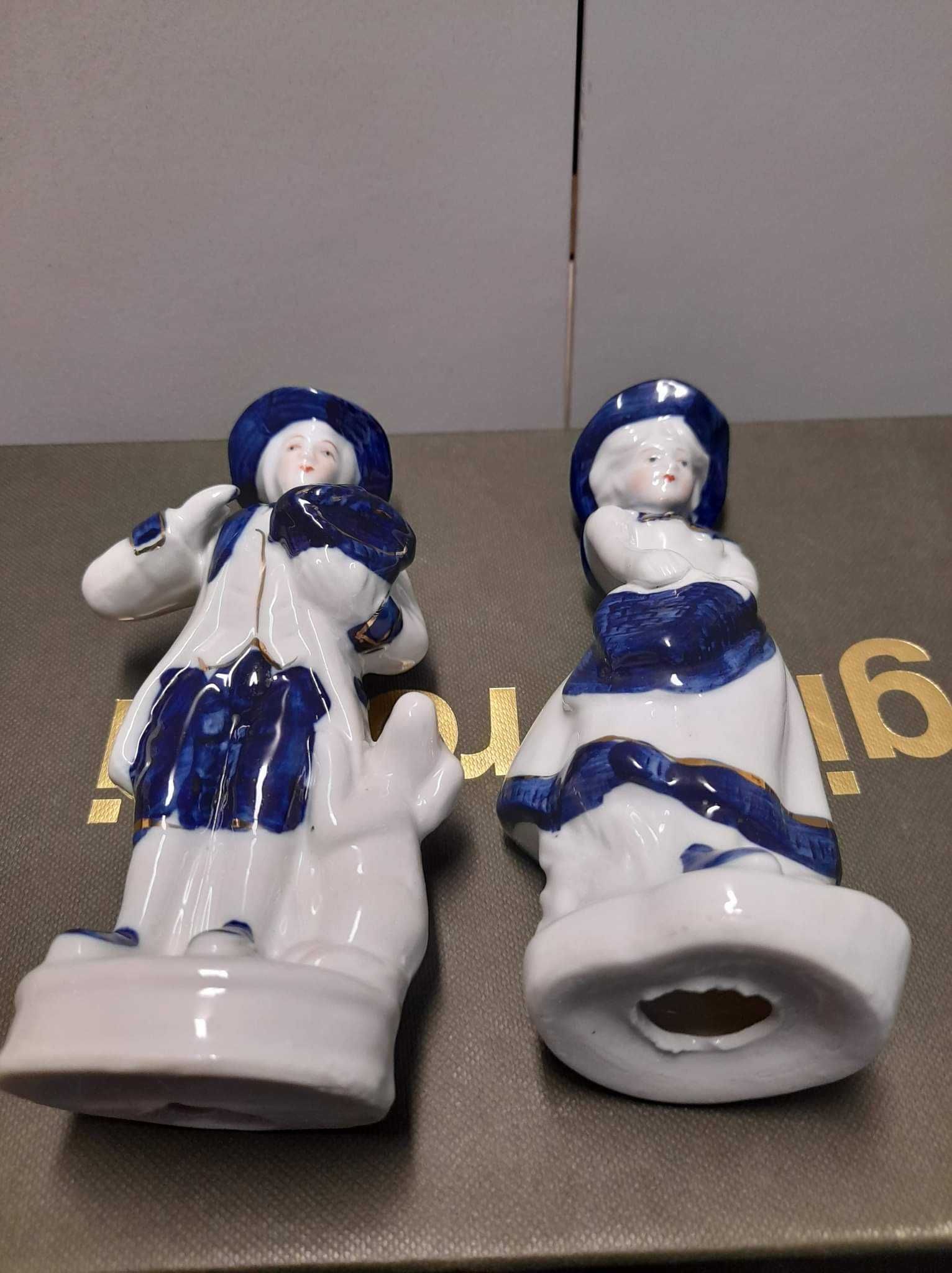 Figurka porcelanowa para z psem