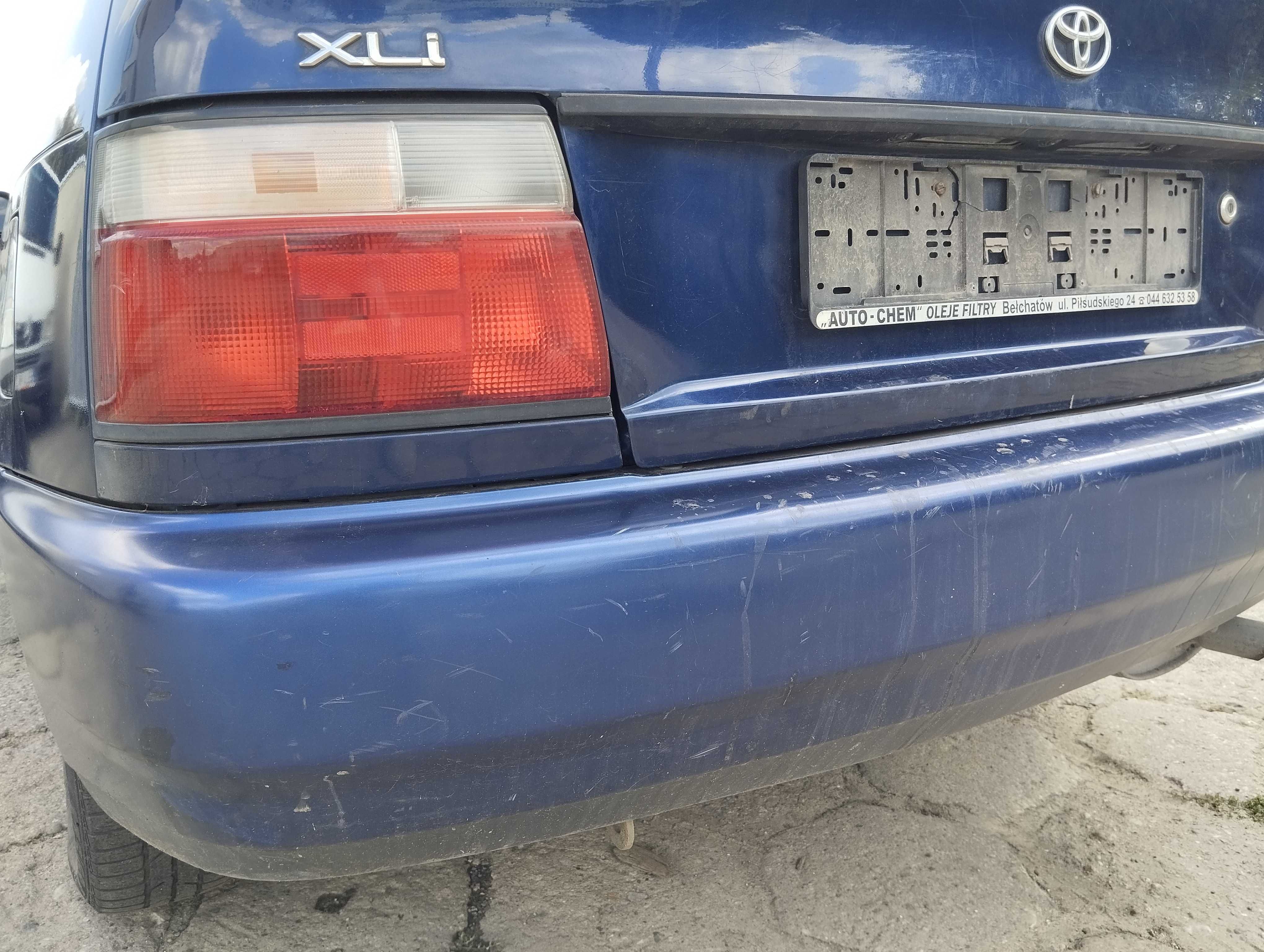 Toyota Corolla E10 3D 1,3i 1995r.Zderzak tylny.