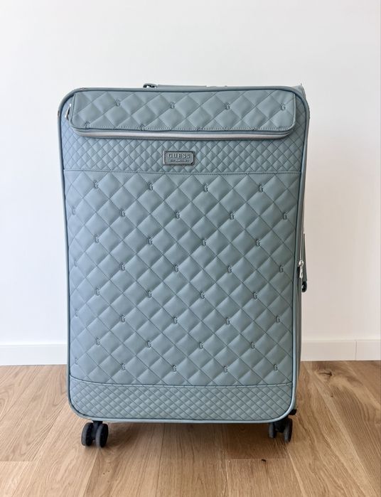 Mala de viagem Guess azul-clara em bom estado