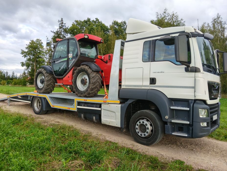 Usługi transportowe lawetą transport maszyn transport bus laweta
