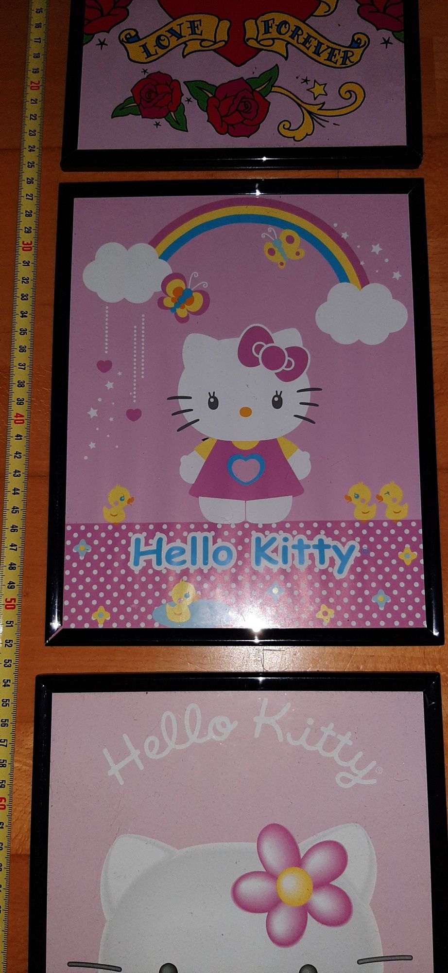 Hello kitty-relogio,4 quadros, 2 dvds,tapete