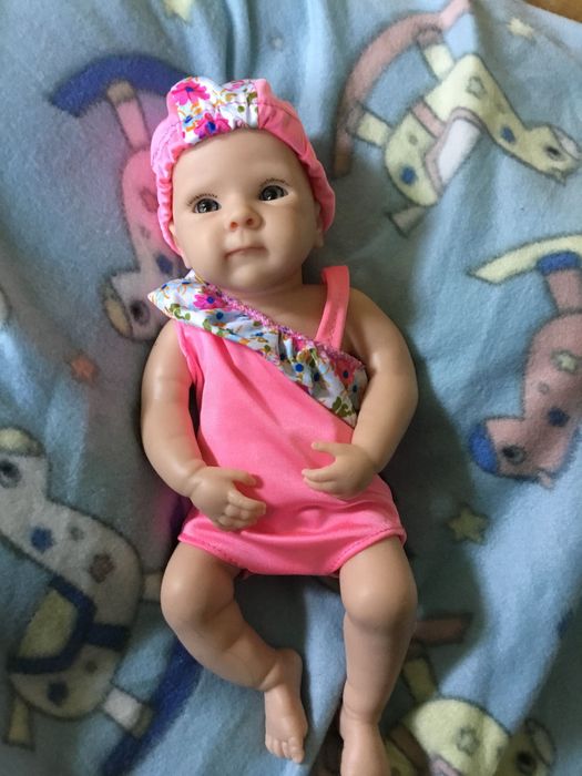 Boneca bebé reborn,verdadeiro silicone (artigos novos)